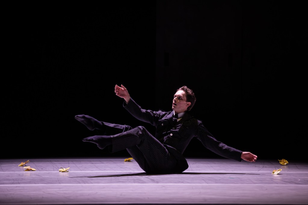 Principal Artist Callum Linnane as Don José in The Australian Ballet's 2024 production of Carmen, choreographed by Johan Inger. Captured in a moment of intense emotion, Linnane's portrayal reflects the character's inner turmoil and descent into obsession. The minimalist stage design and moody lighting underscore the psychological depth of the performance.