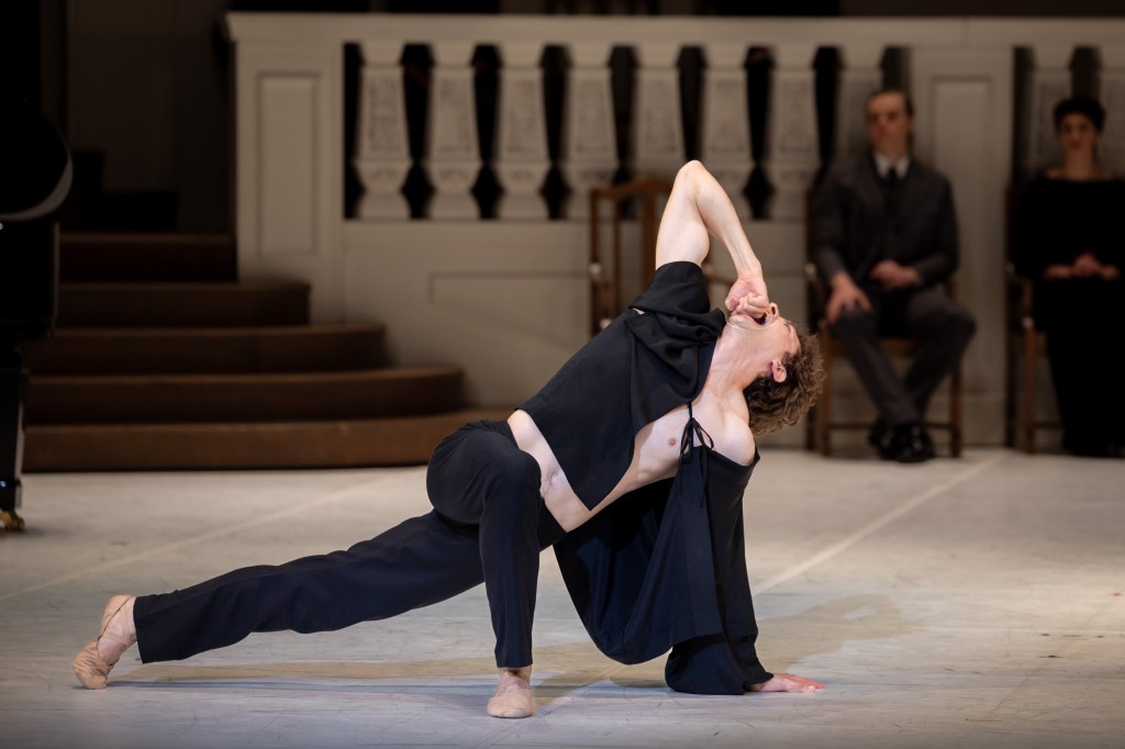 Callum Linnane as Vaslav Nijinsky in The Australian Ballet's 2025 production of Nijinsky, choreographed by John Neumeier. Captured in a moment of intense emotion, Linnane's portrayal reflects the character's inner turmoil and descent into madness. 