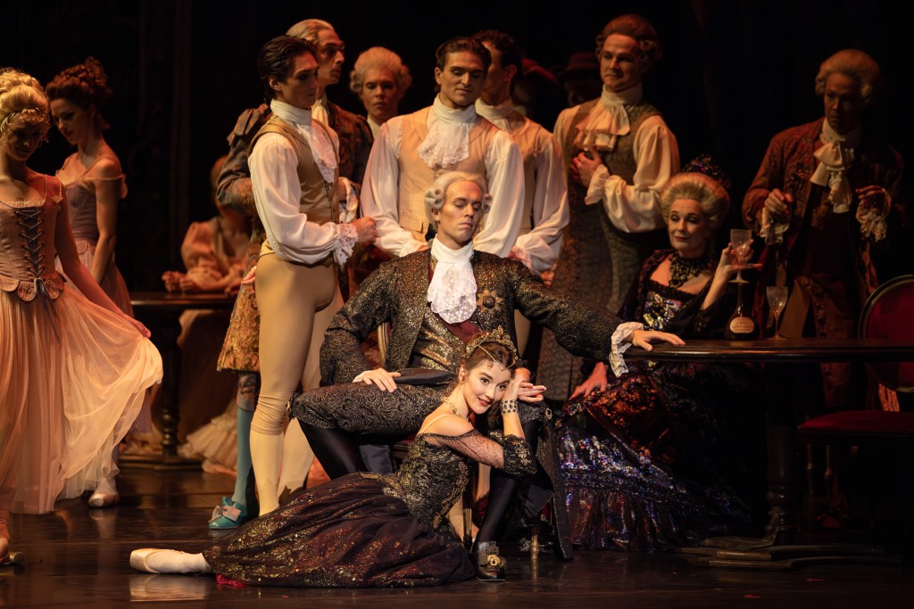 Benedicte Bemet as Manon and Adam Bull as Monsieur G.M. in The Australian Ballet's 2025 production of Manon. Captured in a poignant moment, their performance reflects the complex dynamics of love and power in 18th-century Parisian society. 
