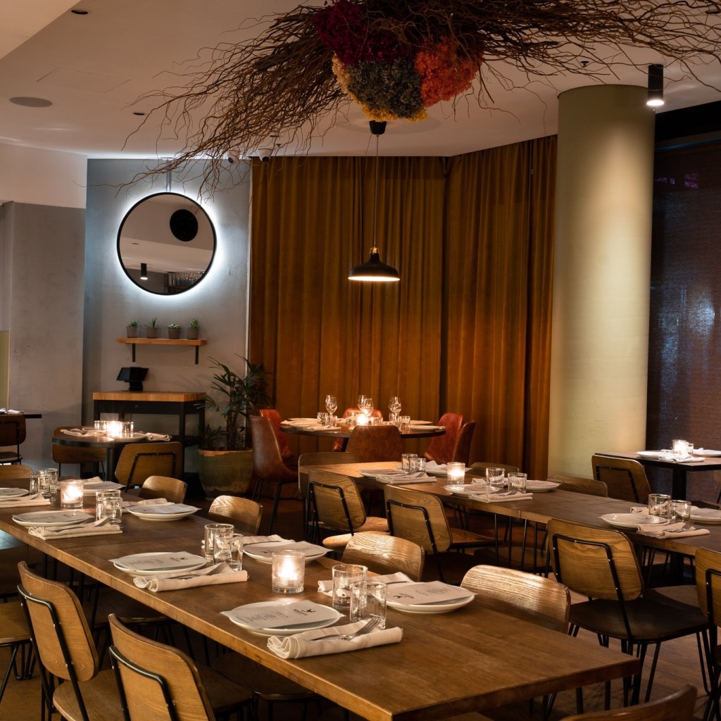 Restaurant interior with warm wooden finishes.
